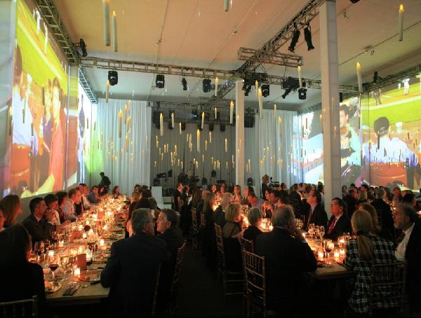 Hundreds of candles floated above the guests 39 tables video imagery brought
